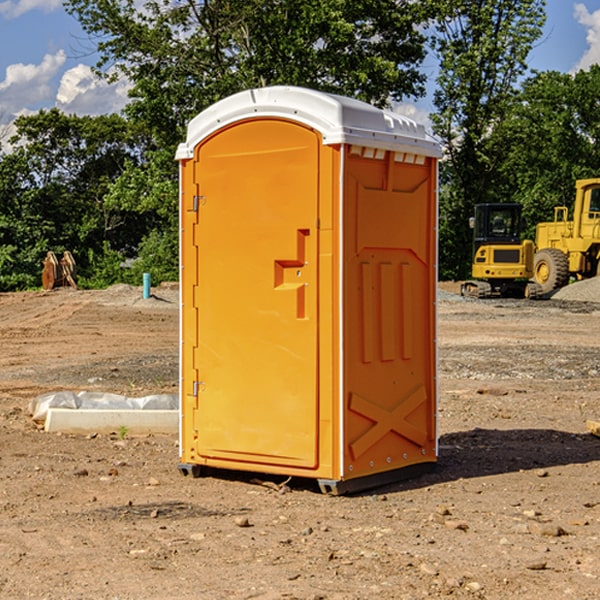 how often are the portable restrooms cleaned and serviced during a rental period in Leland